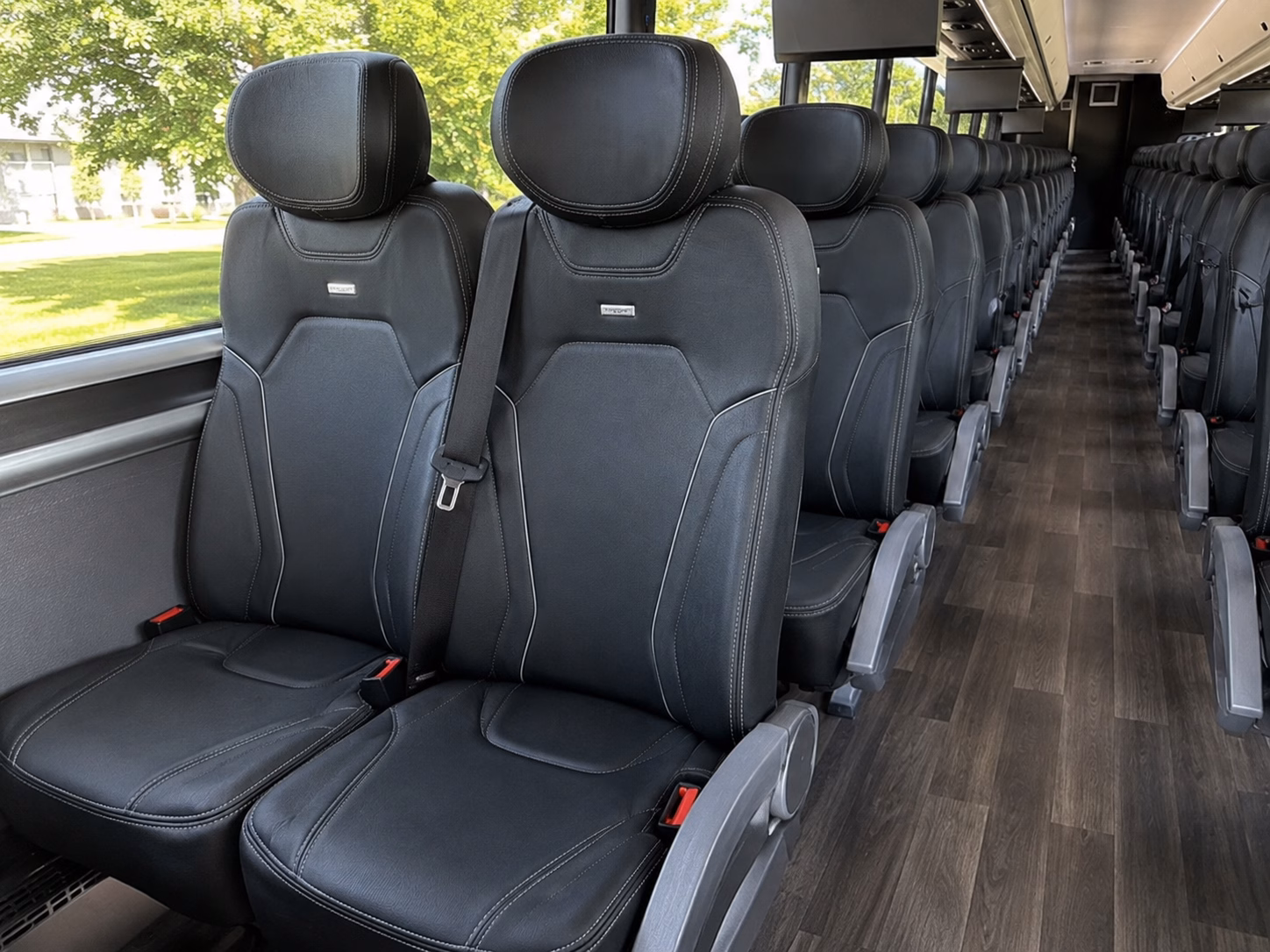 how seasonality and peak times affect charter bus rental prices in southgate michigan